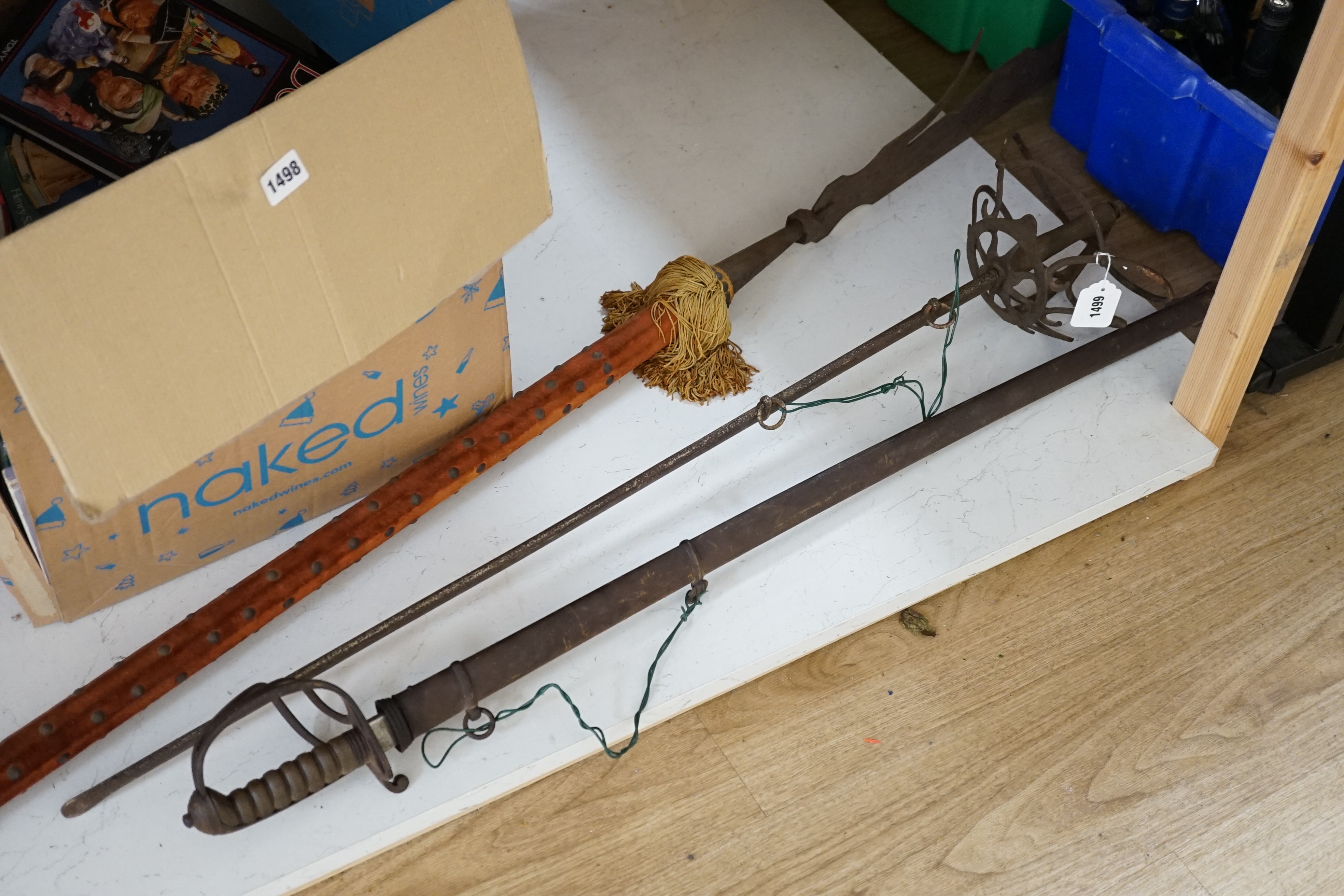 A fencing sword, an army officer's sword and a halberd, latter 255 cms high